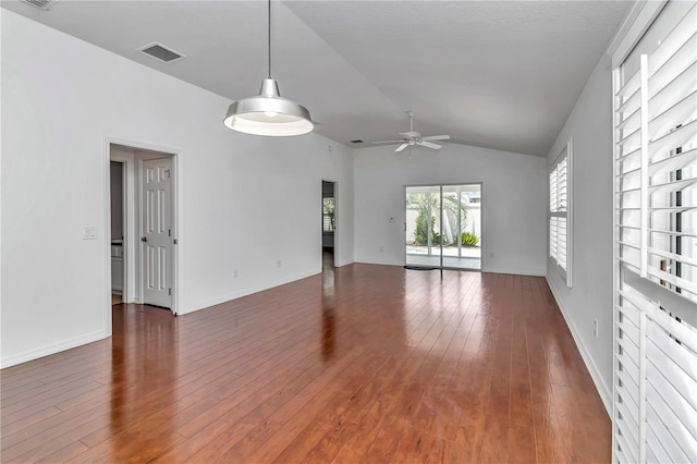 unfurnished room with ceiling fan, wood-type flooring, and lofted ceiling