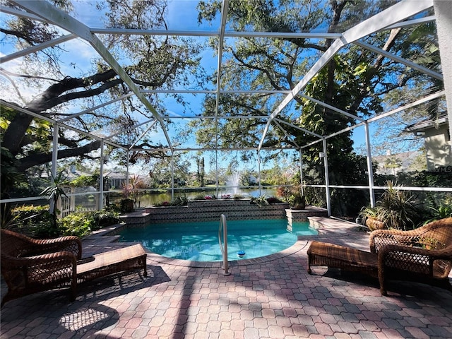 view of pool featuring a lanai and a patio