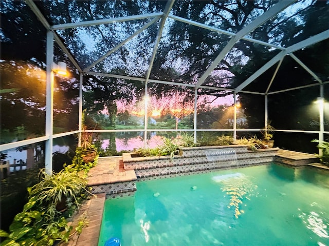 view of pool with a lanai