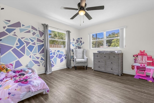 bedroom with hardwood / wood-style flooring and ceiling fan