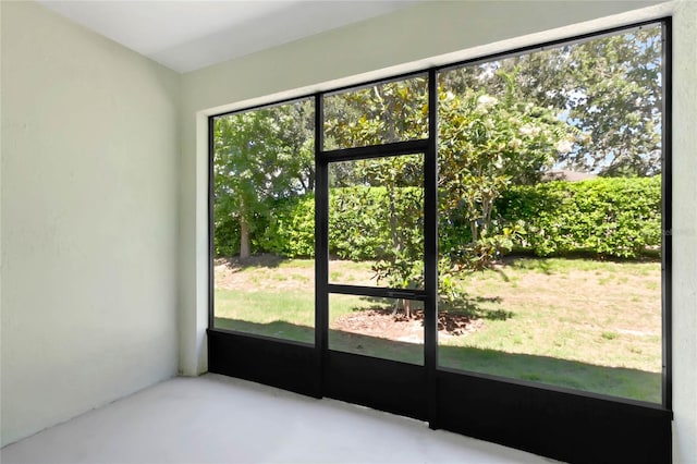 doorway featuring concrete flooring