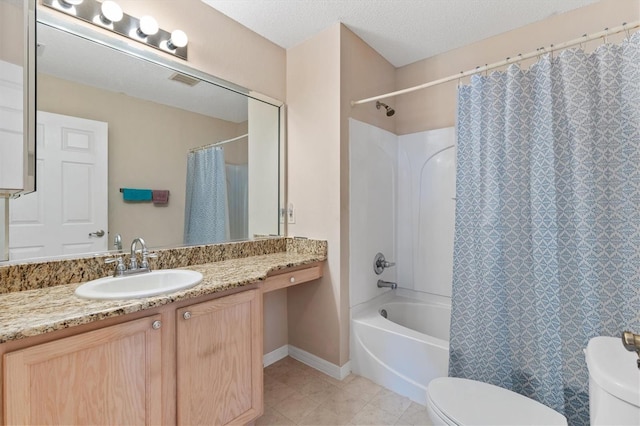 full bathroom featuring shower / tub combo, vanity, a textured ceiling, tile patterned floors, and toilet