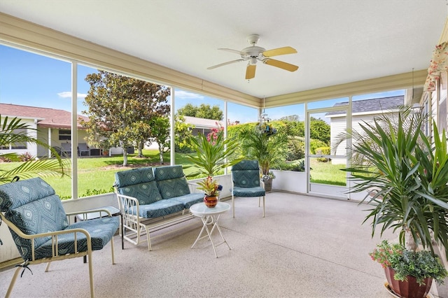 sunroom / solarium with ceiling fan