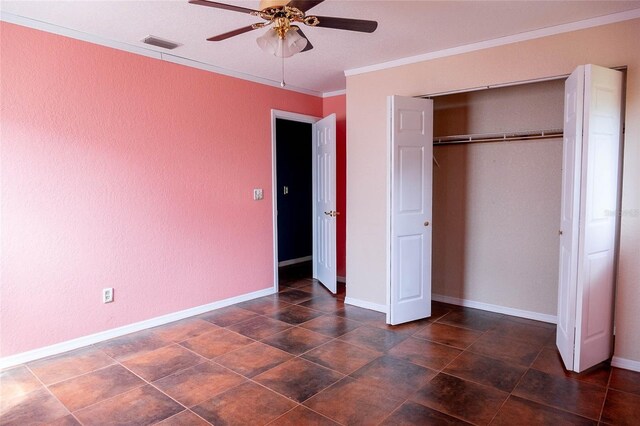 unfurnished bedroom with a closet, a ceiling fan, baseboards, visible vents, and ornamental molding