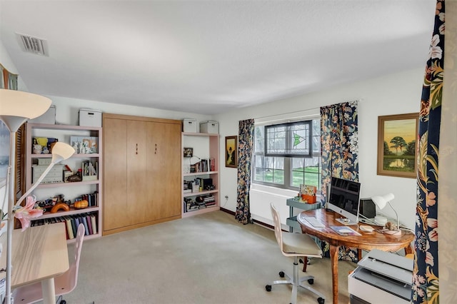 office with visible vents and light colored carpet