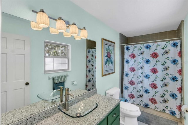 full bathroom with toilet, a shower with curtain, and vanity