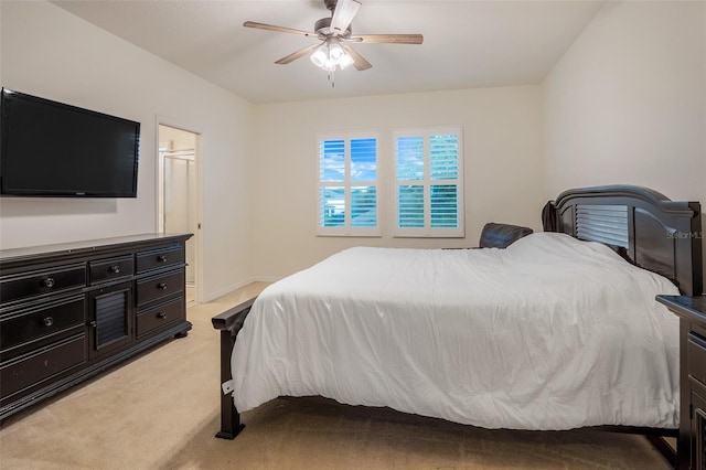 bedroom with light carpet and ceiling fan