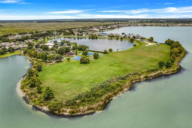 bird's eye view with a water view