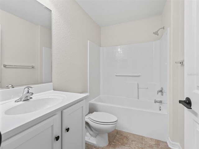 full bathroom featuring vanity, tub / shower combination, and toilet