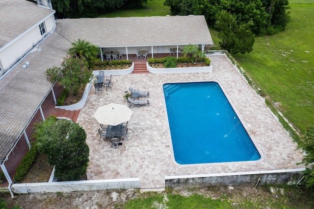 view of pool featuring a patio area