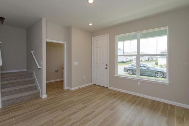 foyer featuring light wood-type flooring