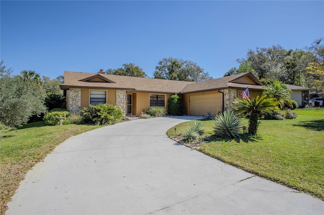 view of front of home with a garage, stone siding, concrete driveway, a front lawn, and a chimney