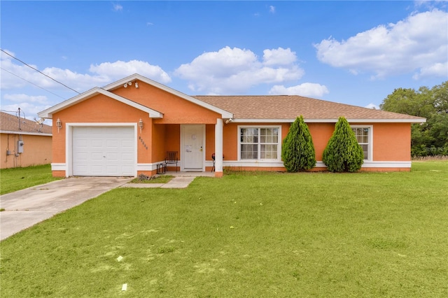 single story home with a front lawn and a garage