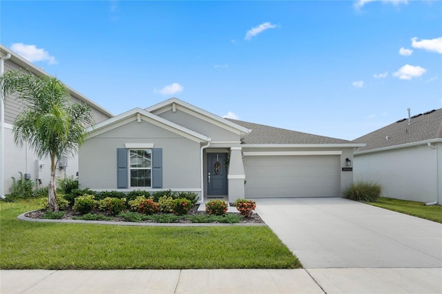 single story home featuring a garage and a front yard