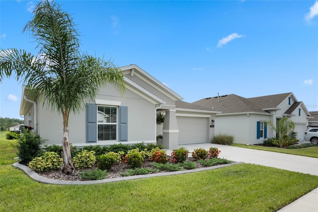 view of front facade featuring a garage and a front yard