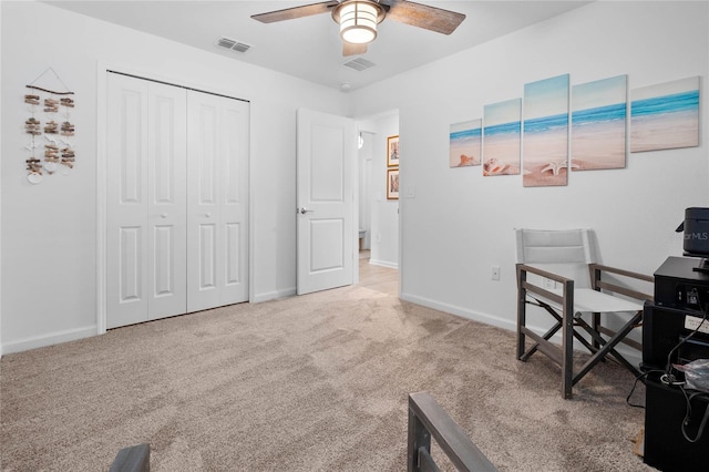 office space featuring carpet flooring and ceiling fan