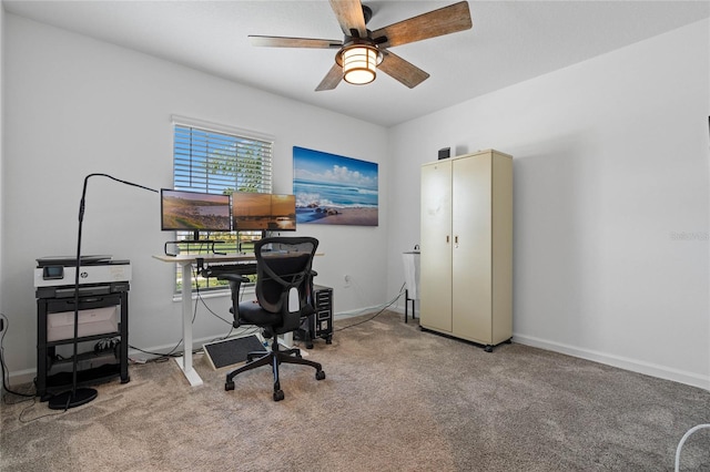 office space featuring ceiling fan and carpet floors