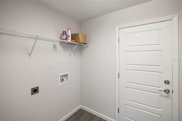 washroom with washer hookup, dark hardwood / wood-style floors, and hookup for an electric dryer