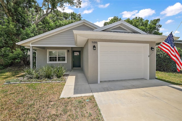 single story home with a garage