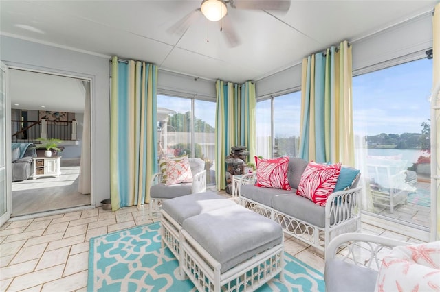 sunroom / solarium with ceiling fan