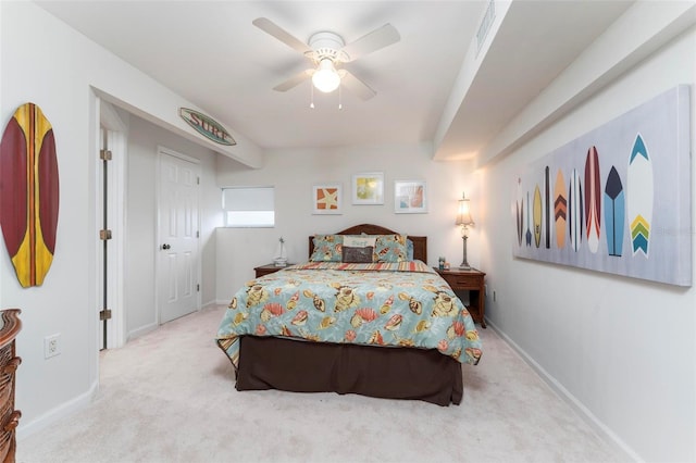 bedroom featuring ceiling fan and light colored carpet