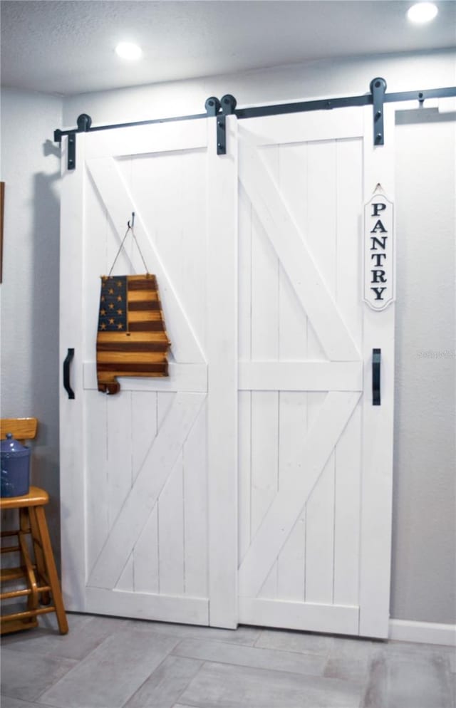 room details featuring a barn door