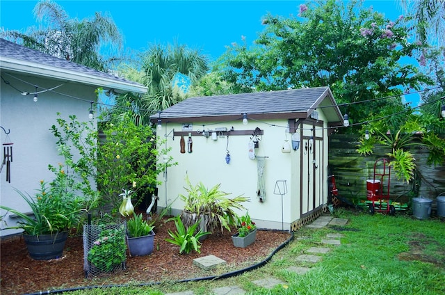 view of outdoor structure with a lawn