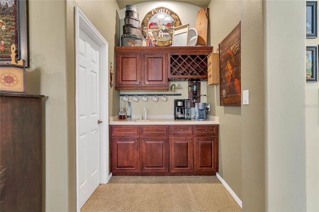 bar featuring light colored carpet