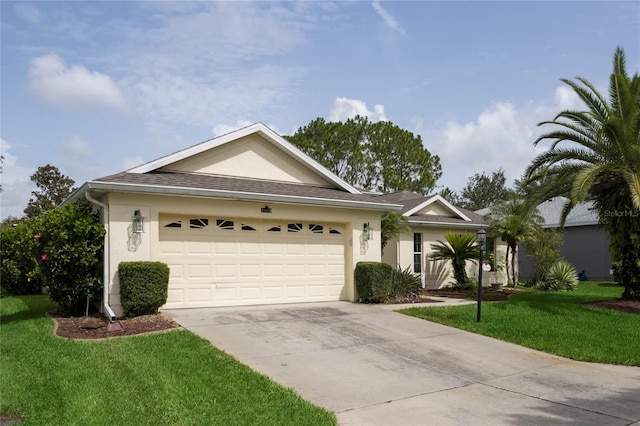 single story home featuring a garage and a front lawn