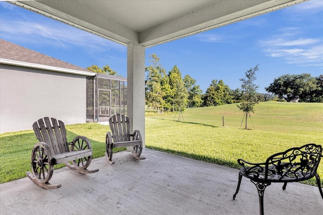 view of patio / terrace featuring a lanai