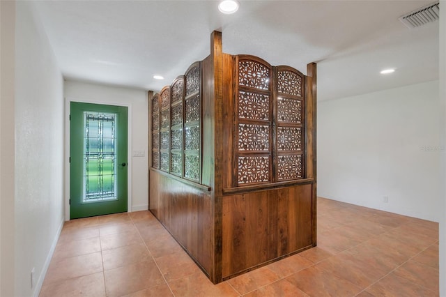 interior space featuring light tile patterned floors