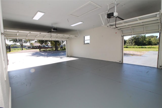 garage featuring a garage door opener