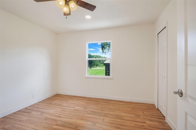 unfurnished bedroom with baseboards, recessed lighting, a ceiling fan, and light wood-style floors