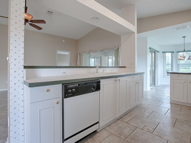 kitchen with white dishwasher, sink, white cabinets, and ceiling fan