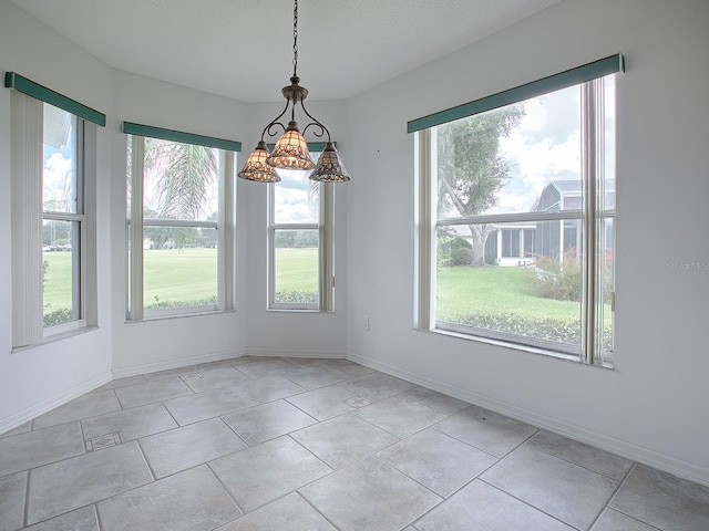 unfurnished dining area featuring a healthy amount of sunlight