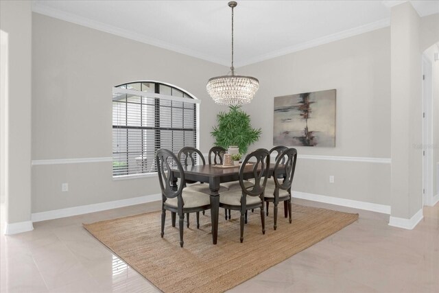 dining space featuring ornamental molding and an inviting chandelier