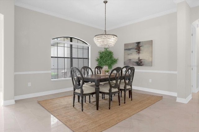 dining space with ornamental molding and a chandelier