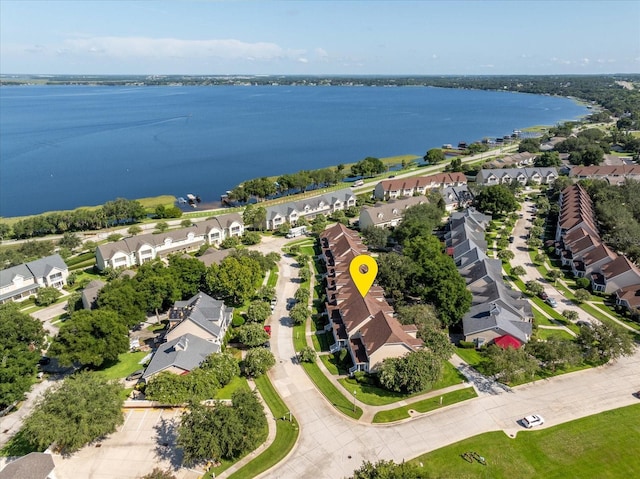 drone / aerial view with a water view