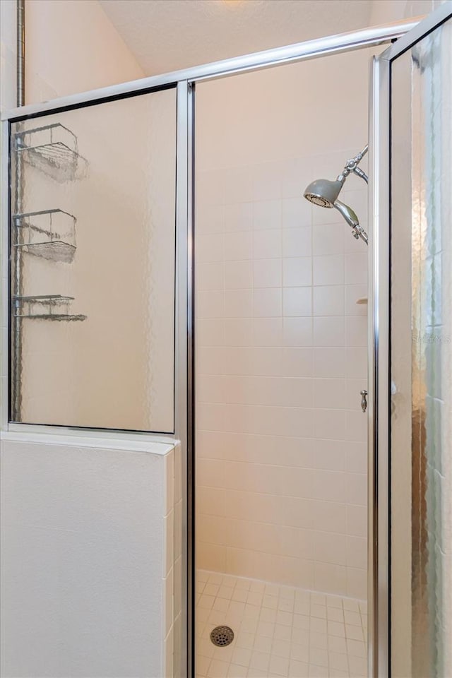 bathroom featuring walk in shower