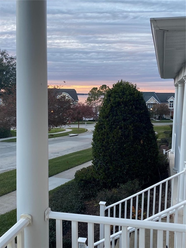 view of yard at dusk