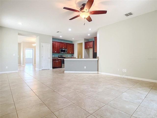 unfurnished living room with recessed lighting, visible vents, light tile patterned flooring, baseboards, and ceiling fan with notable chandelier