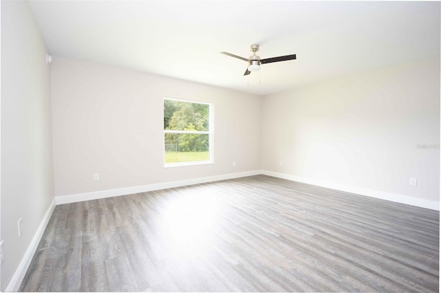 unfurnished room featuring wood-type flooring and ceiling fan