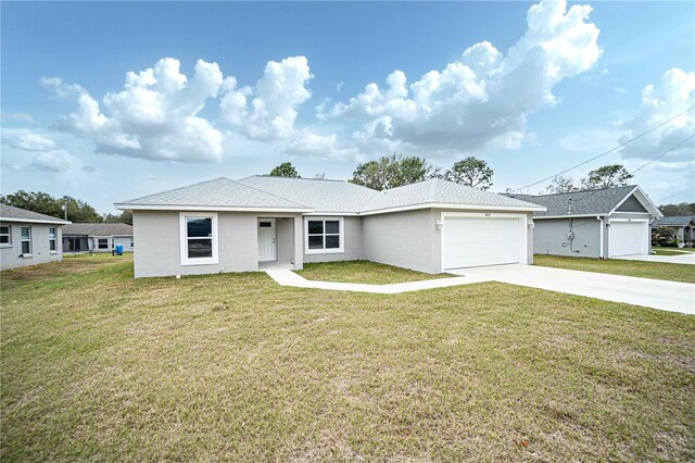 ranch-style home with a garage and a front lawn