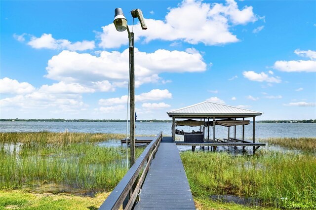 dock area featuring a water view