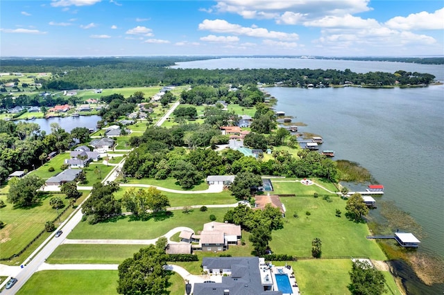 bird's eye view with a water view