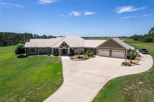 single story home with a garage and a front yard