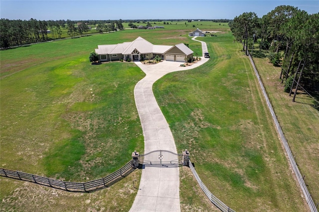 birds eye view of property featuring a rural view