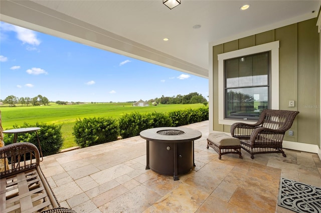 view of patio / terrace with a fire pit