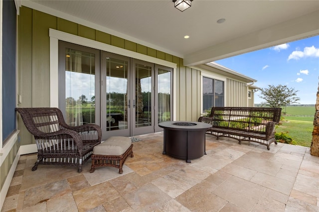 view of patio featuring a fire pit