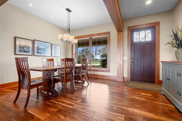 dining room with wood-type flooring